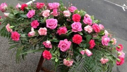 Rose coffin floral display